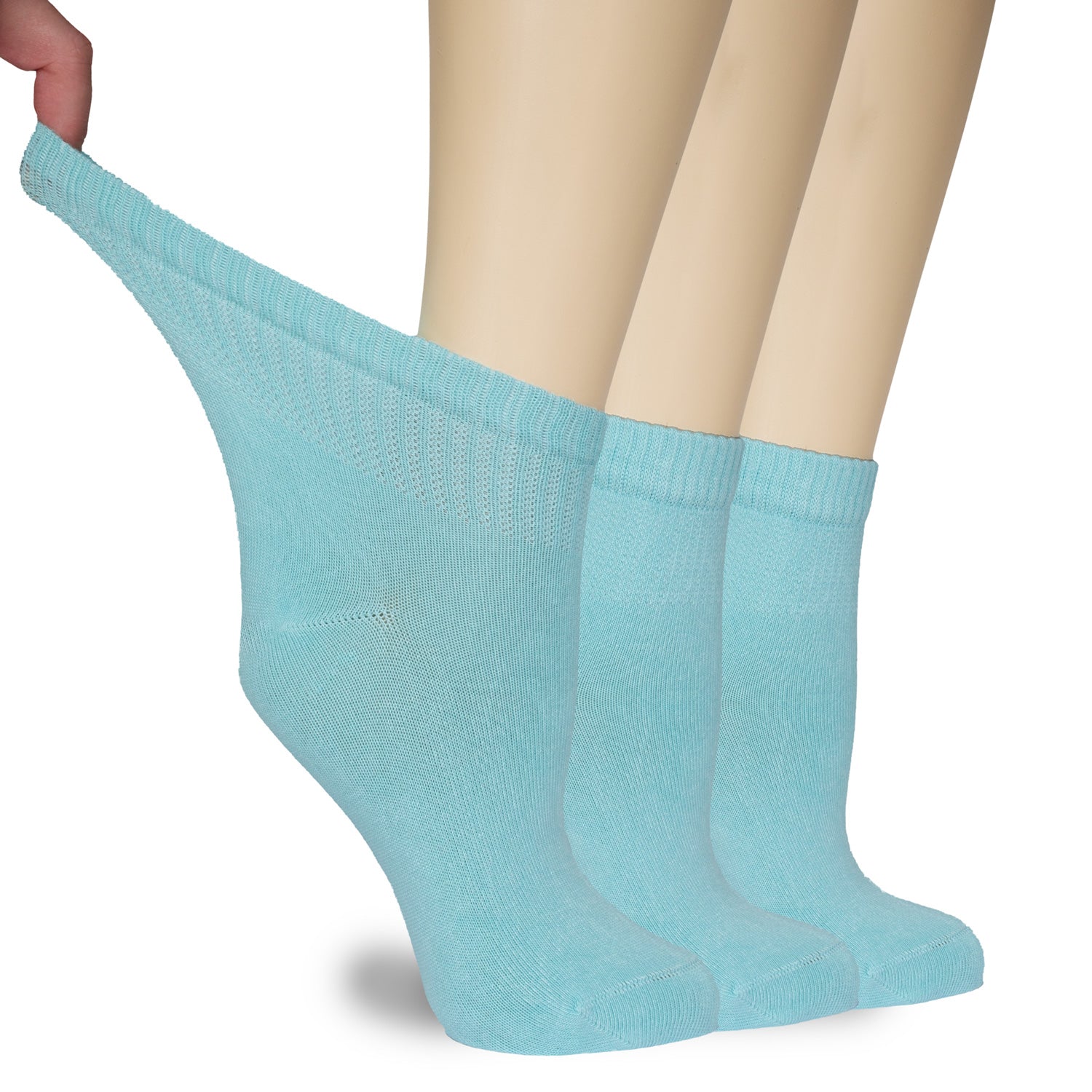 A woman's legs adorned with three Women's Diabetic Bamboo Ankle Socks in pool blue, providing comfort and support for those with diabetes.
