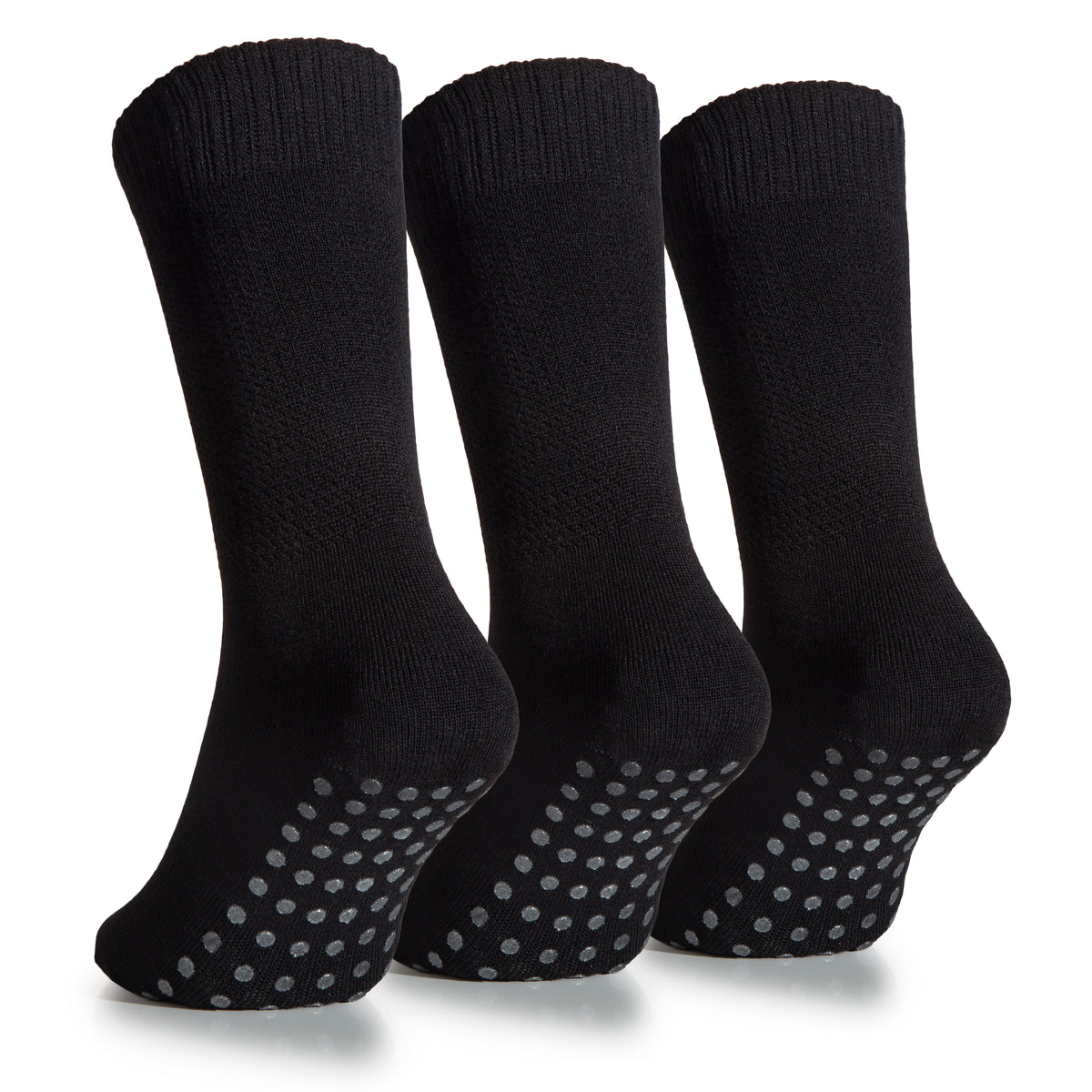 This image depicts three Women's Bamboo Diabetic Ankle Non Slip Grip Socks. The socks are black with dots on them.
