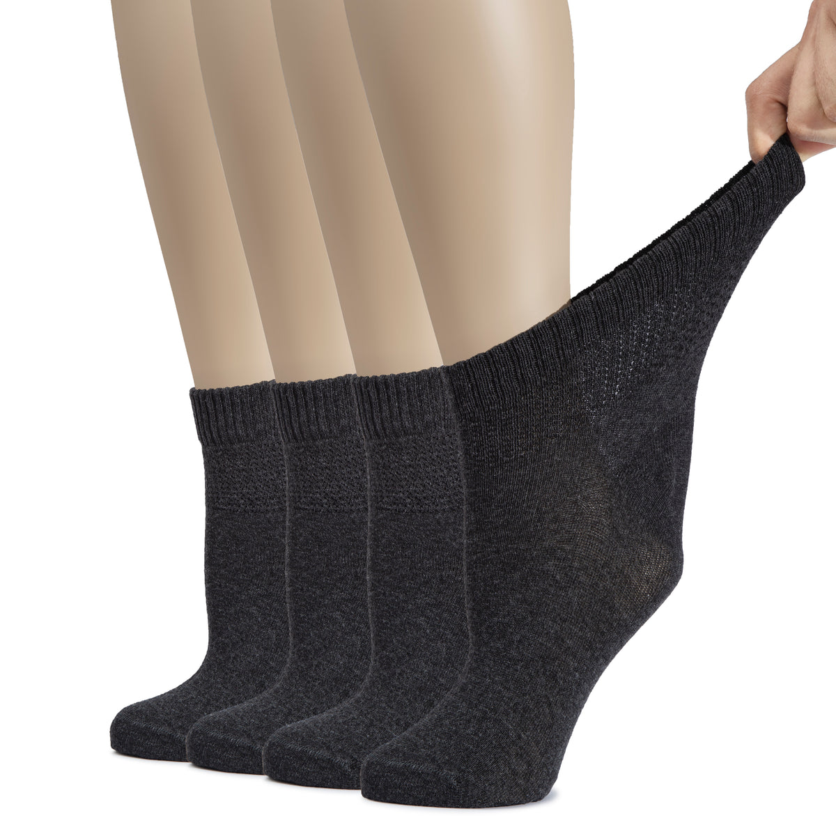 Women's Cotton Diabetic Ankle Socks are shown on a woman's feet in NavyBlue / Black socks, with one foot raised. The socks offer comfort and support for those with diabetes.