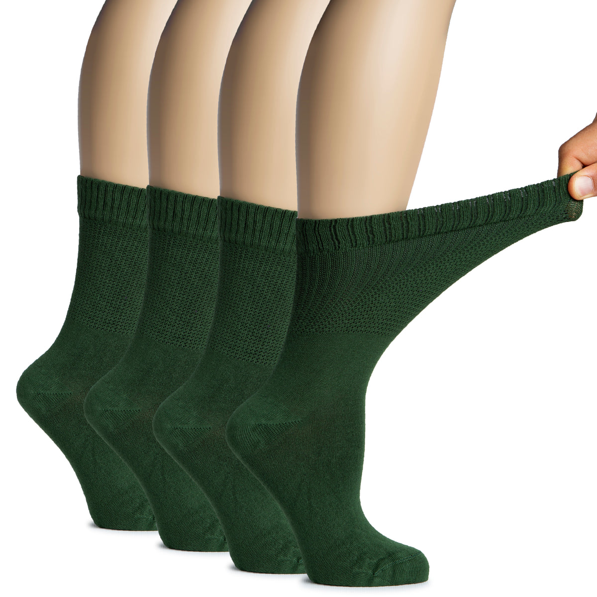 A man's hand displays two pair of green Women's Bamboo Diabetic Crew Socks, designed to provide comfort and support for those with diabetes.