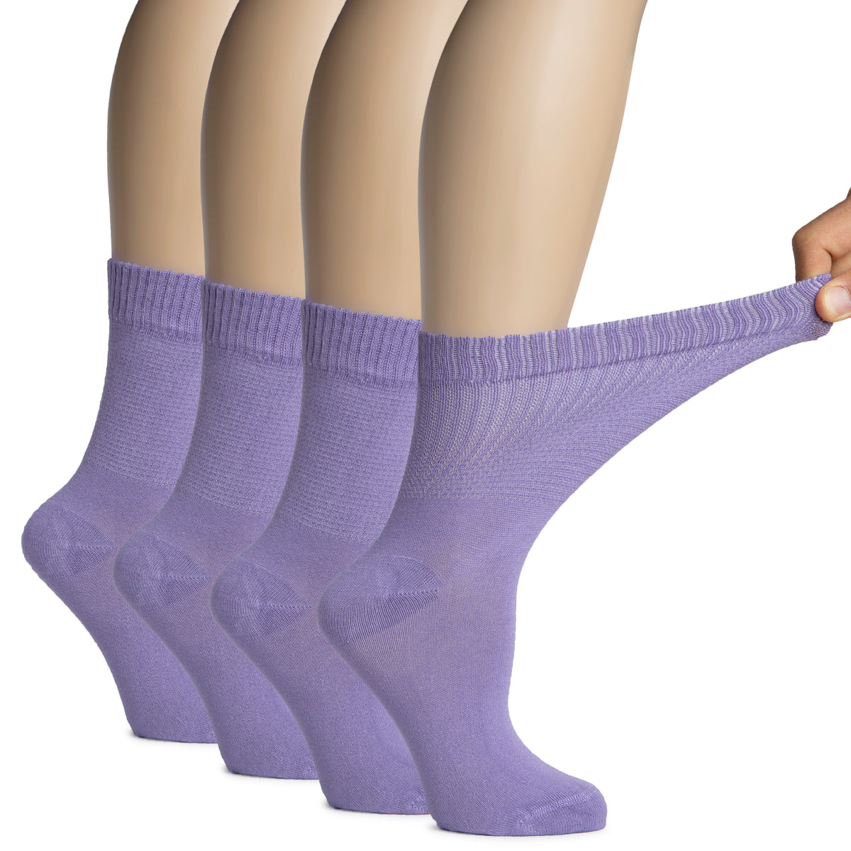 A man's hand rests on a woman's feet adorned in purple socks. The socks are Women's Bamboo Diabetic Crew Socks.