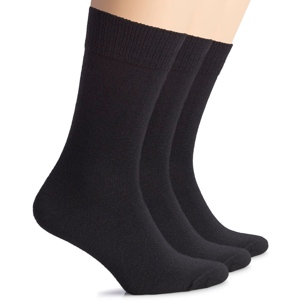 Black women’s wool crew socks by Hugh Ugoli, sleek and durable for warmth and everyday elegance.