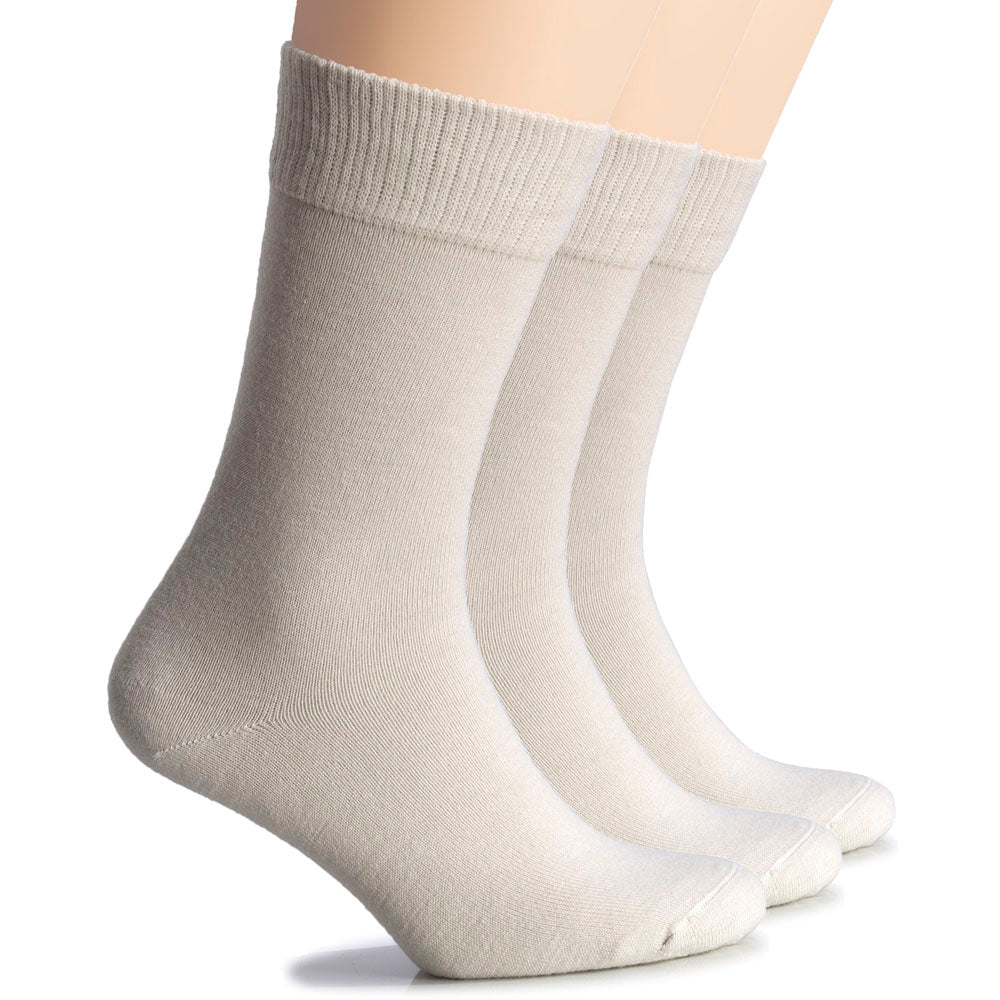 Ecru women’s wool crew socks by Hugh Ugoli, lightweight and cozy with a refined neutral tone.